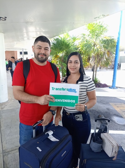 Travelers welcomed by Transfers Plus at Cancun Airport before their private transfer