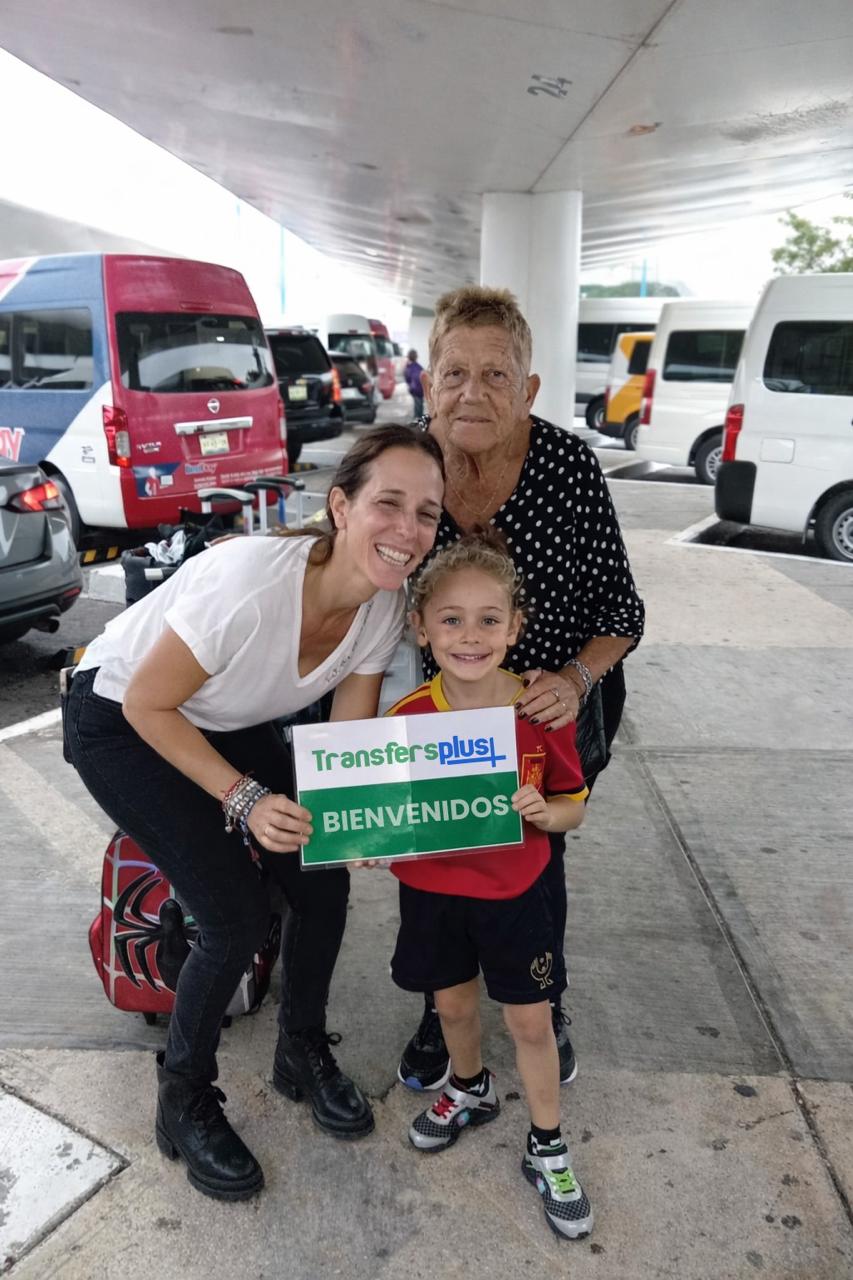 Family welcomed by Transfers Plus at Cancun Airport for private transportation